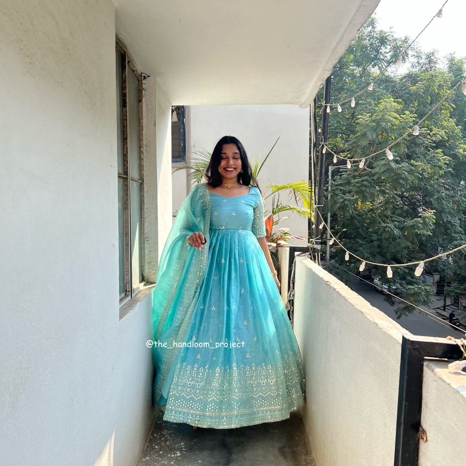 Light blue dress   gold